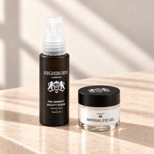 Revive and Defy 30ml serum and 15ml Eye Gel on pale stone; styled product illustration